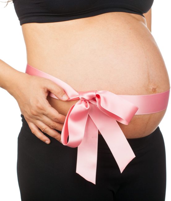 pregnant-woman-with-pink-ribbon-around-her-belly-2021-08-27-16-21-29-utc (1)